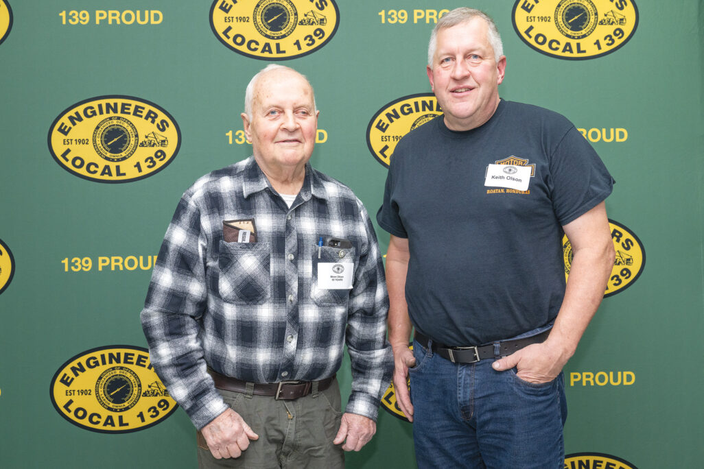 55-year member Miron and son Keith Olson