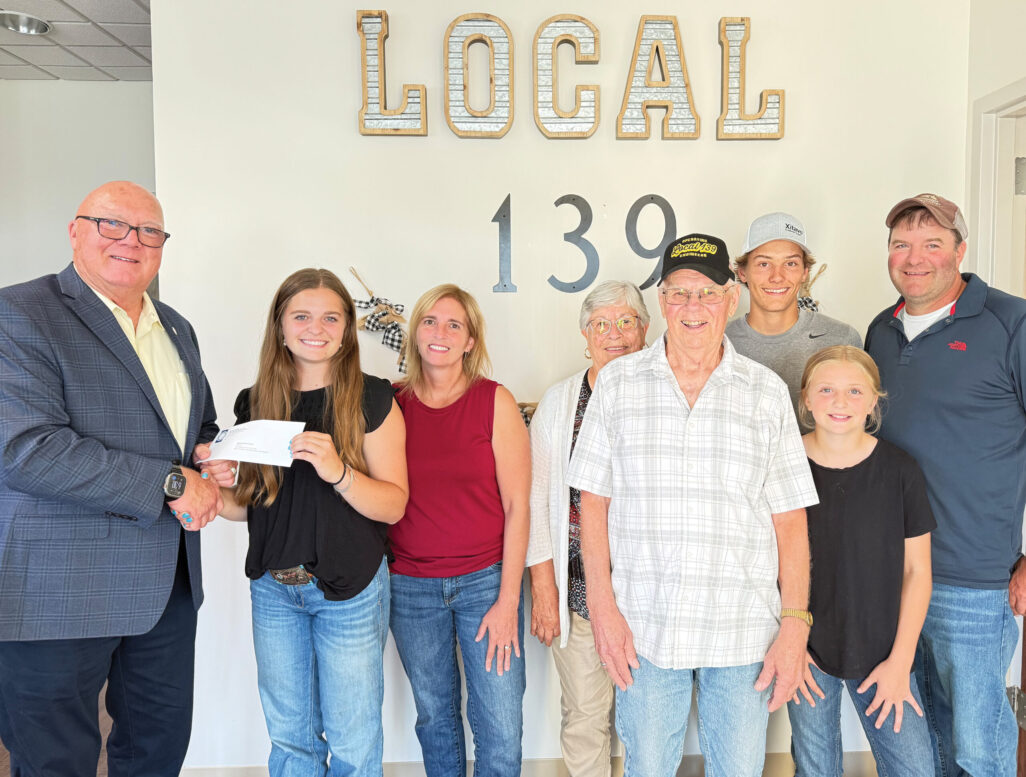 District C scholarship recipient Isabelle Marie Kolek with President/Business Manager Terry McGowan, mother Sarah Kolek,
grandparents Dora and Donald Korpela (member), boyfriend Kolyn Wolf, sister Ailee Kolek and father Todd Kolek.