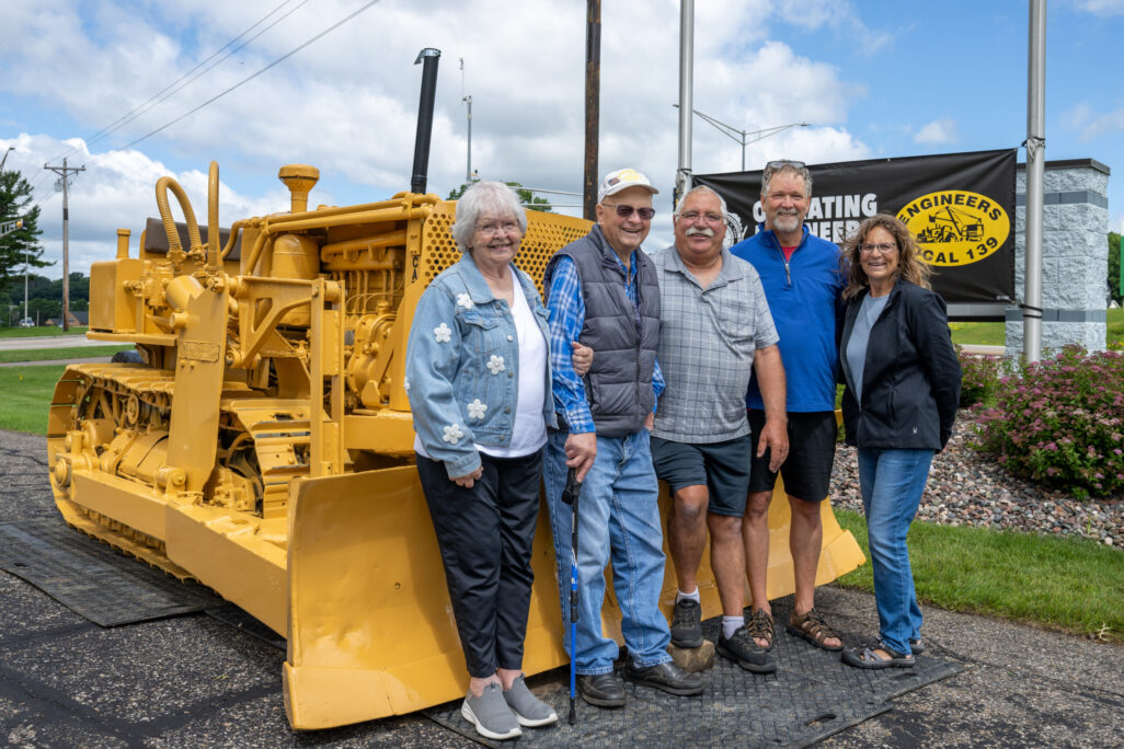 Bill Jensen's friends and family gather in front of the RD6 at the Union office in Altoona. From left to right: Pat Jensen, Bill Jensen, Al Scholze, Jeryl Vonderheid, Sherri Vonderheid.